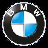 BMW logo featuring a circular black ring with white B and M letters, and a quartered circle in white and blue